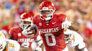 Arkansas Razorbacks running back Braylen Russell runs for a big gain against the Tennessee Volunteers at Razorback Stadium in Fayetteville, Ark.
