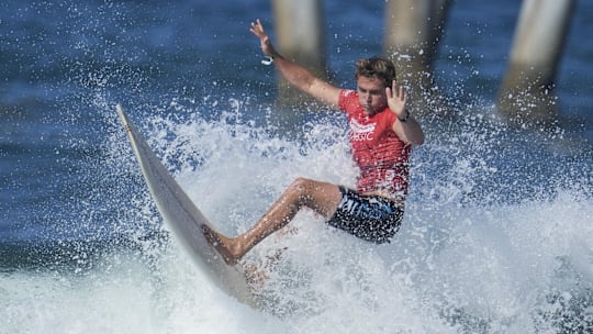 Aug 2, 2023; Huntington Beach, CA, USA; Declan Wyton of Australia competes in Huntington Beach Longboard Classic at the 2023 US Open of Surfing at the Huntington Beach Pier. Mandatory Credit: Robert Hanashiro-USA TODAY