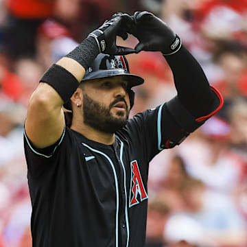 Jun 7, 2025; Cincinnati, Ohio, USA; Arizona Diamondbacks third baseman Eugenio Suarez (28) reacts after hitting a solo home run in the second inning against the Cincinnati Reds at Great American Ball Park.
