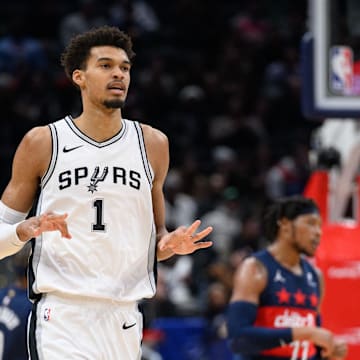 Feb 10, 2025; Washington, District of Columbia, USA; San Antonio Spurs center Victor Wembanyama (1) reacts after making a three point field goal during the first quarter against the Washington Wizards at Capital One Arena. Mandatory Credit: Reggie Hildred-Imagn Images