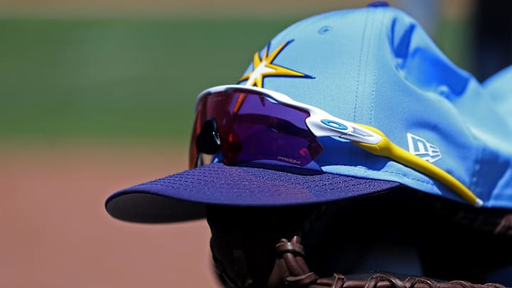 Mar 21, 2018; Port Charlotte, FL, USA; A view of Oakley sunglasses on the New Era Spring Training hat in the game of the Boston Red Sox against the Tampa Bay Rays at Charlotte Sports Park. Mar 21, 2018; Port Charlotte, FL, USA; A view of Oakley sunglasses on the New Era Spring Training hat in the game of the Boston Red Sox against the Tampa Bay Rays at Charlotte Sports Park.