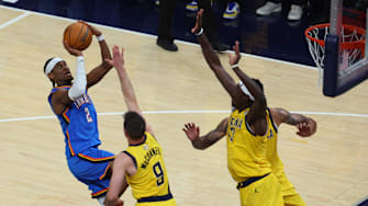 Jun 13, 2025; Indianapolis, Indiana, USA; Oklahoma City Thunder guard Shai Gilgeous-Alexander (2) drives to the hoop past Indiana Pacers guard T.J. McConnell (9) during the third quarter of game four of the 2025 NBA Finals at Gainbridge Fieldhouse. Mandatory Credit: Trevor Ruszkowski-Imagn Images