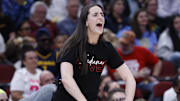 Indiana Fever guard Caitlin Clark (22)reacts to a basket scored by a teammate against the Chicago Sky during the first half of a WNBA game at United Center.