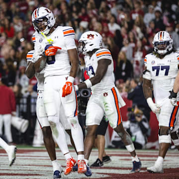 Nov 30, 2024; Tuscaloosa, Alabama, USA; Auburn Tigers wide receiver Cam Coleman (8) celebrates after scoring a touchdown against the Alabama Crimson Tide during the third quarter at Bryant-Denny Stadium. Mandatory Credit: Will McLelland-Imagn Images