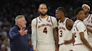 Apr 5, 2025; San Antonio, TX, USA; Auburn Tigers head coach Bruce Pearl talks with his players against the Florida Gators in the semifinals of the men's Final Four of the 2025 NCAA Tournament at the Alamodome. Mandatory Credit: Robert Deutsch-Imagn Images
