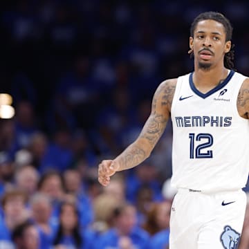 Apr 22, 2025; Oklahoma City, Oklahoma, USA; Memphis Grizzlies guard Ja Morant (12) walks down the court in the third quarter of game two of first round for the 2024 NBA Playoffs against the Oklahoma City Thunder at Paycom Center. Mandatory Credit: Alonzo Adams-Imagn Images