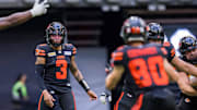 Jun 17, 2023; Vancouver, British Columbia, CAN; BC Lions quarterback Vernon Adams Jr. (3) passes the ball to BC Lions receiver Ayden Eberhardt (80) against the Edmonton Elks in the first half at BC Place. Mandatory Credit: Bob Frid-Imagn Images